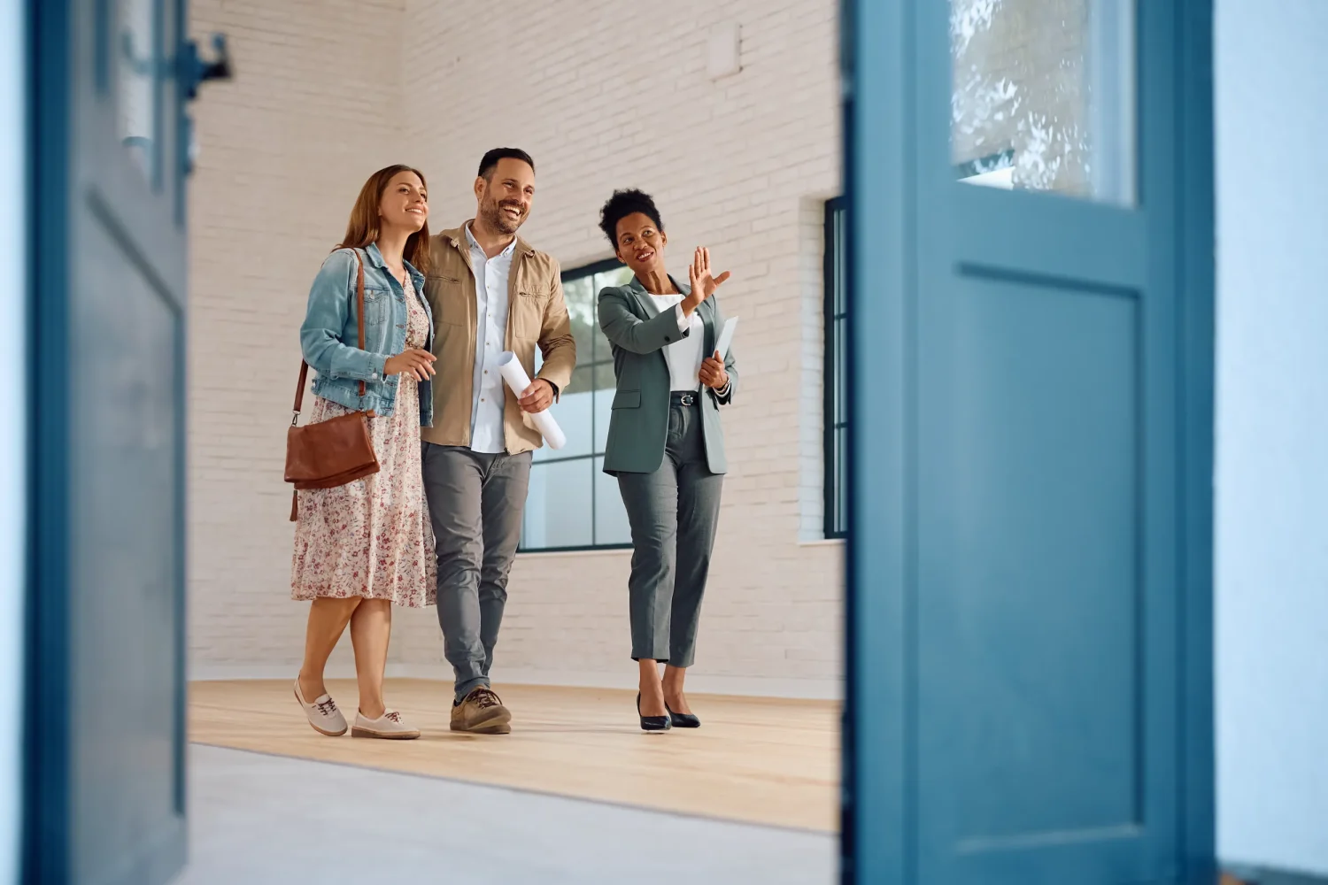 Realtor showing house to couple
